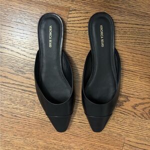 Black Veronica Beard Carlotta leather mules. Excellent condition like new.